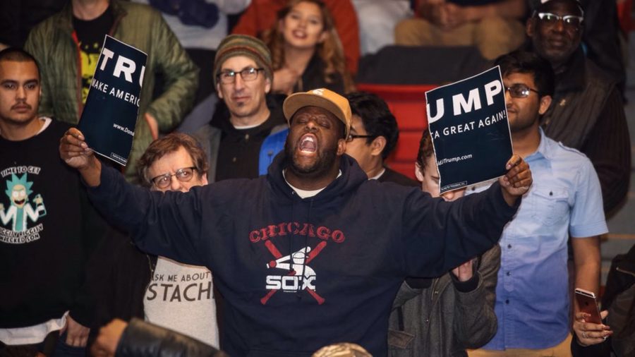 A Protestor at a Trump rally fighting the #BlackLivesMatter movement- Dark Horse News