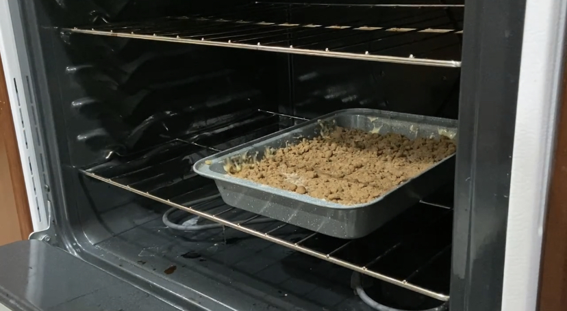 Putting out dessert into the oven