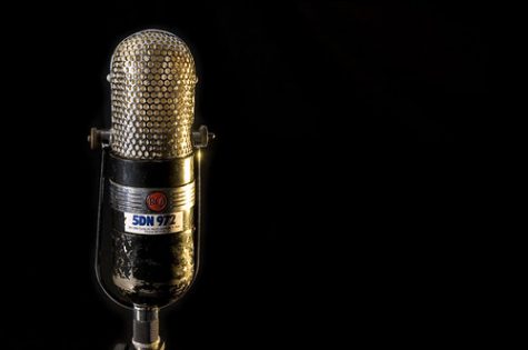 Microphone on the left side of black background