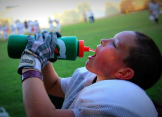Kid athlete drinking Gatorade