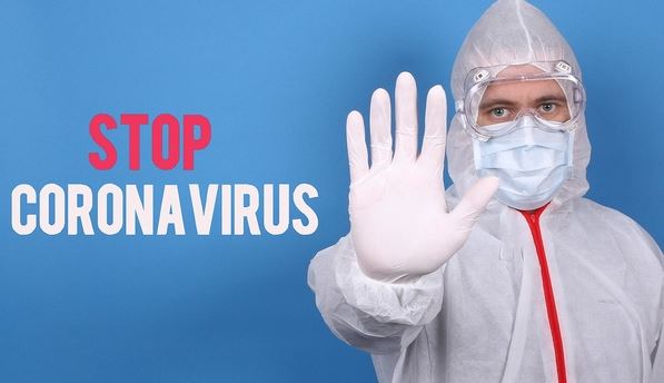 Man holding up hand saying "Stop Coronavirus"