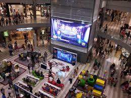 a mall of games and people inside