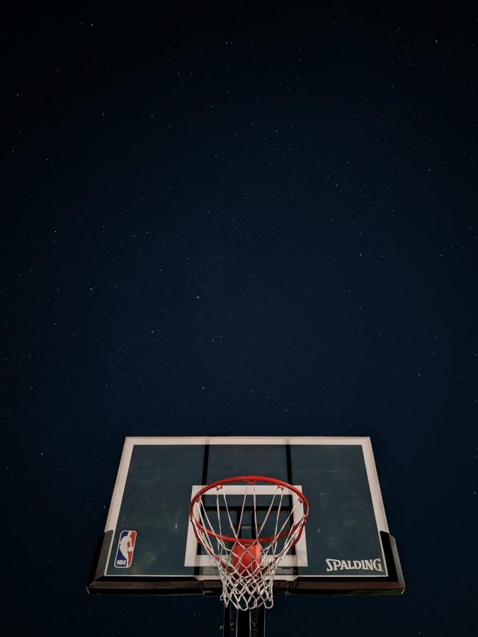 Image of basketball backboard and hoop.