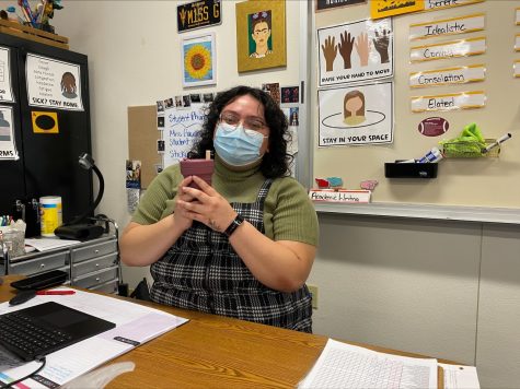 Picture of Ms. Gaucin holding her coffee cup during an interview