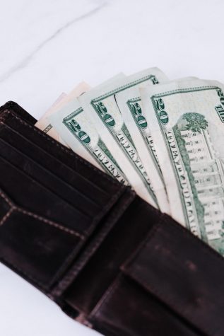 Picture of money in a wallet.