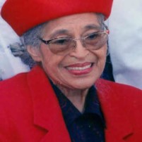 Rosa Parks smiling in a red clothing